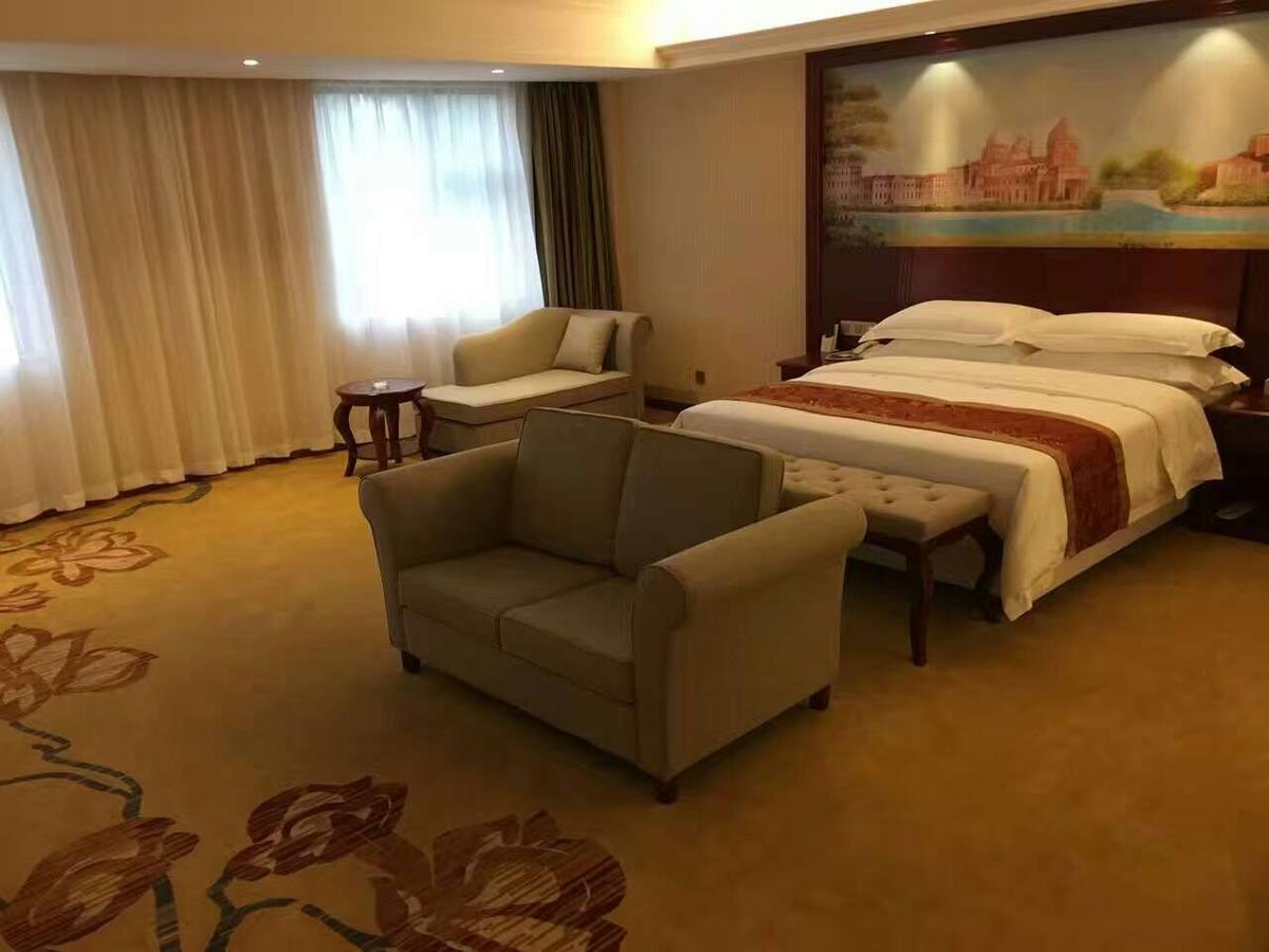 Vienna Hotel Zhongshan Guzhen Town Center Exterior photo